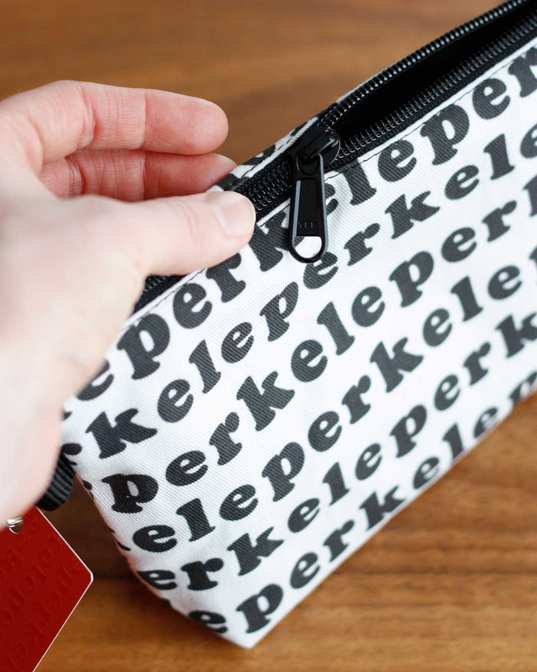 Perkele Pouch M, Many colours