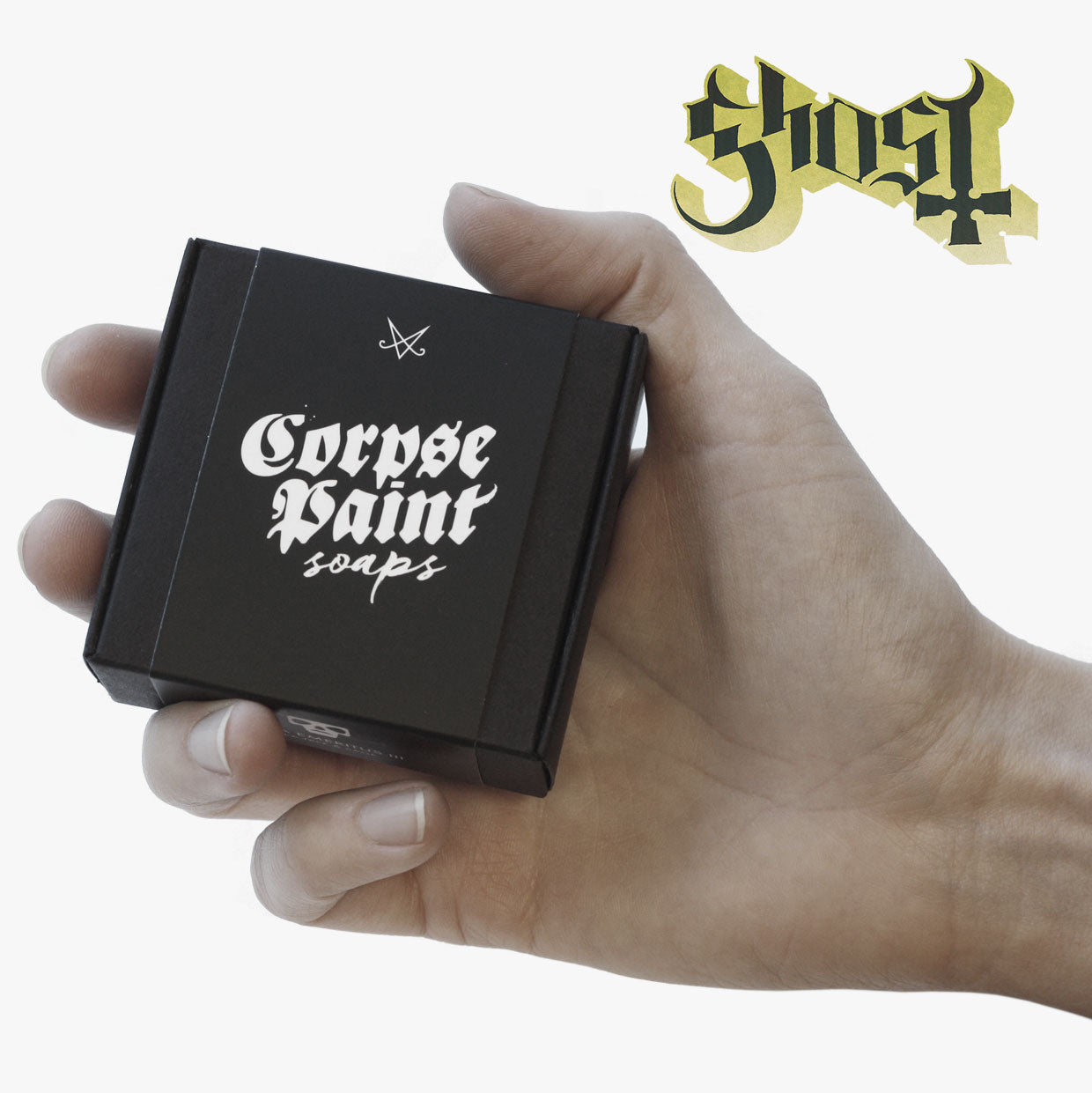Official Ghost soap in the image of Papa Emeritus Terzo III Soap black box packaging in hand